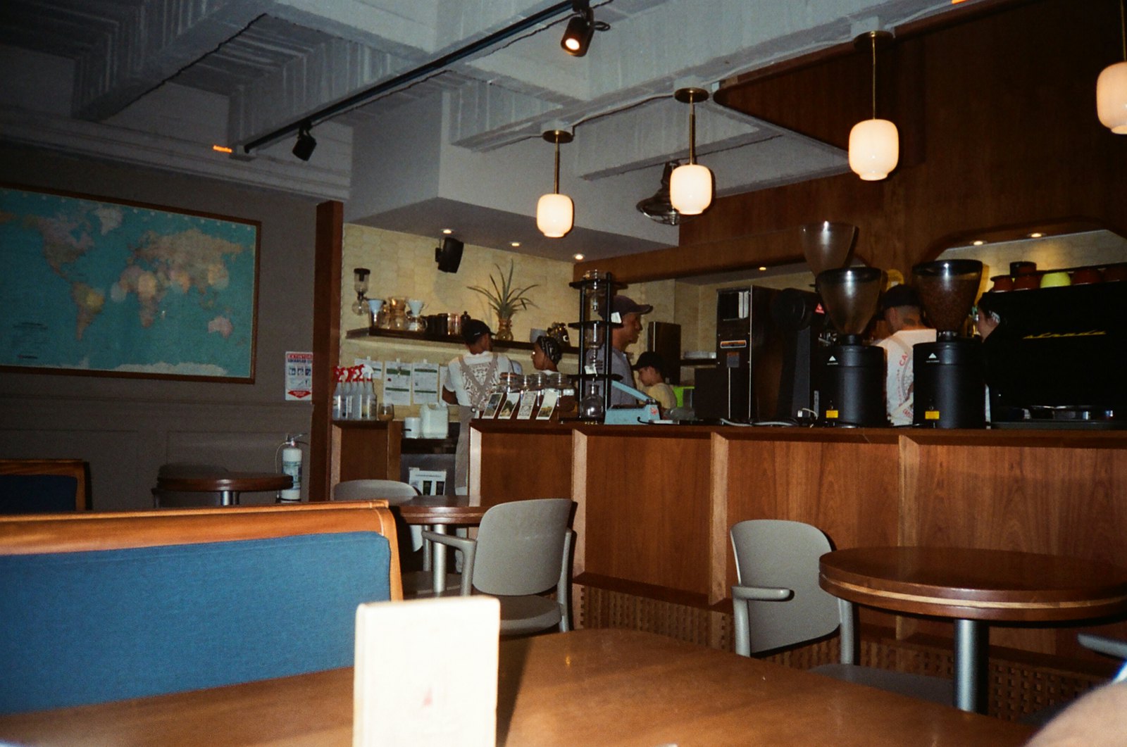 A warm coffeehouse interior for the fictional Kape Kanto café